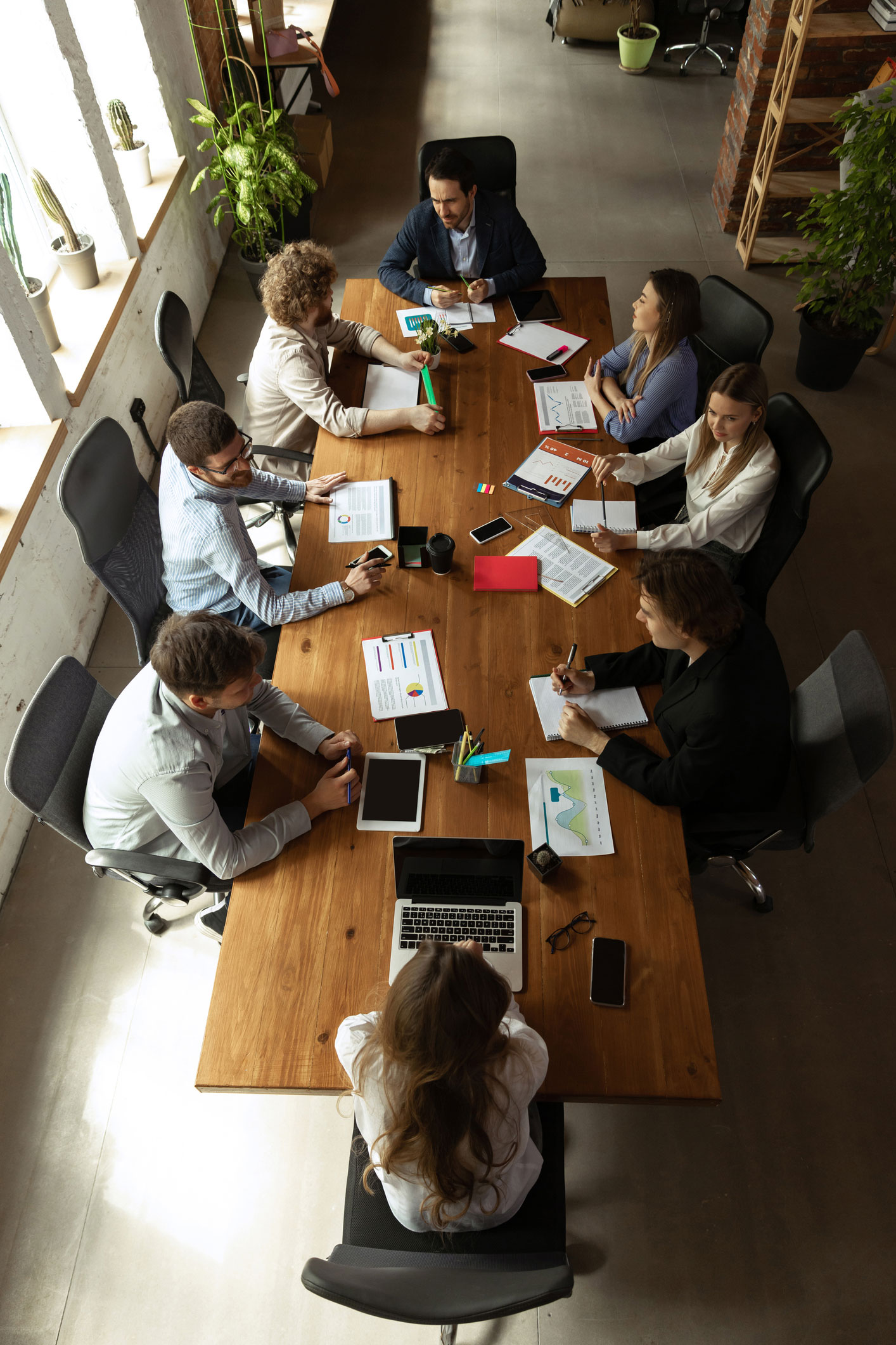 Cheerful senior small online business owner holding an office meeting