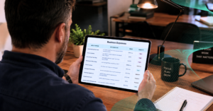 business owner reviewing ways to reduce costs